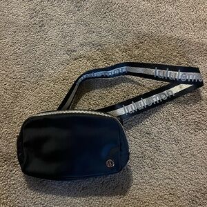 Lululemon black and gold everywhere belt bag